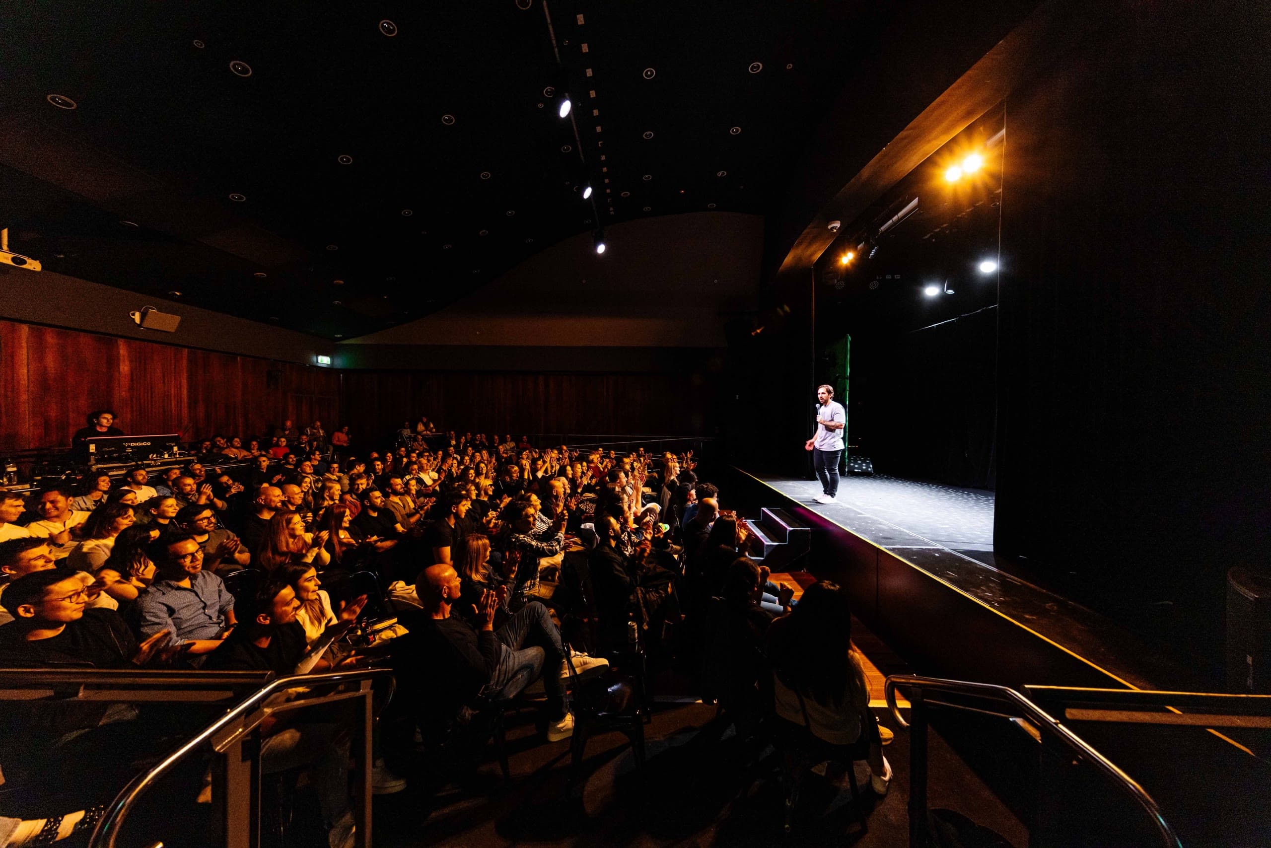 A packed theatre watching Anthony Locascio